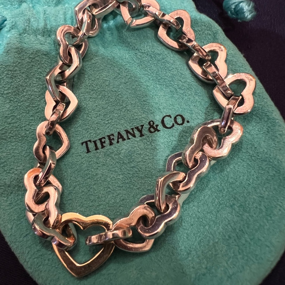 Tiffany & Co. silver heart bracelet, with gold middle heart